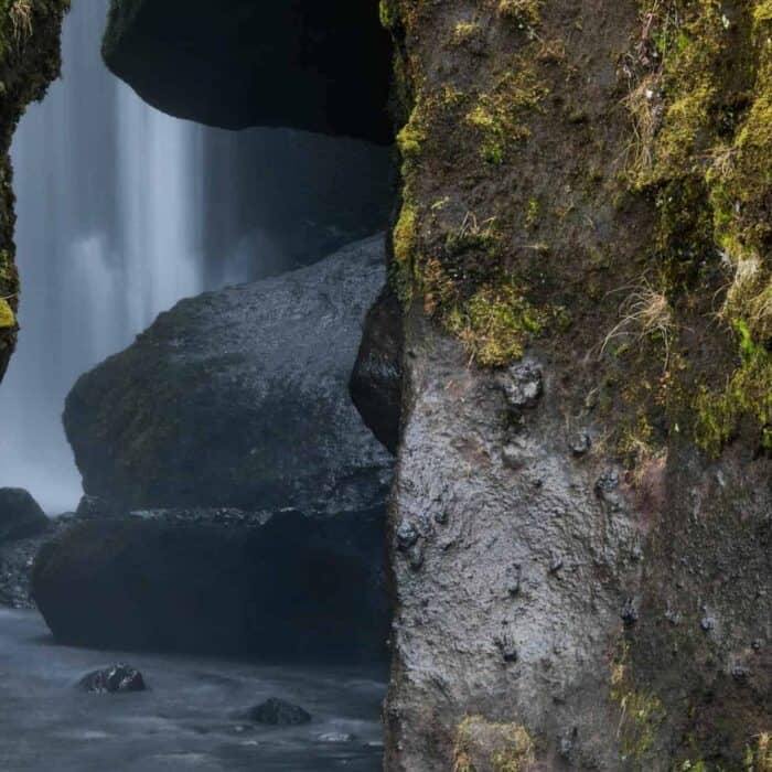 Gljúfrabúi waterfall hidden behind cliff rock in south Iceland.