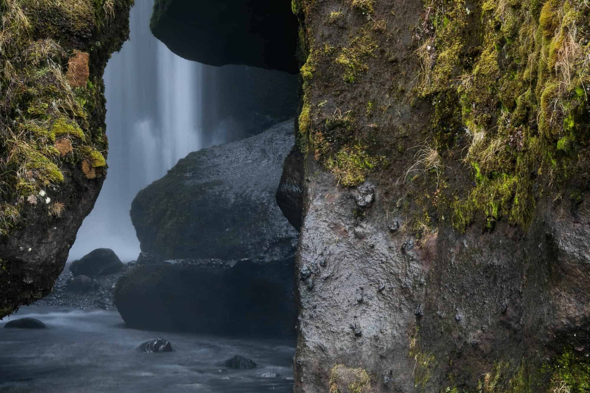 Gljúfrabúi waterfall hidden behind cliff rock in south Iceland.