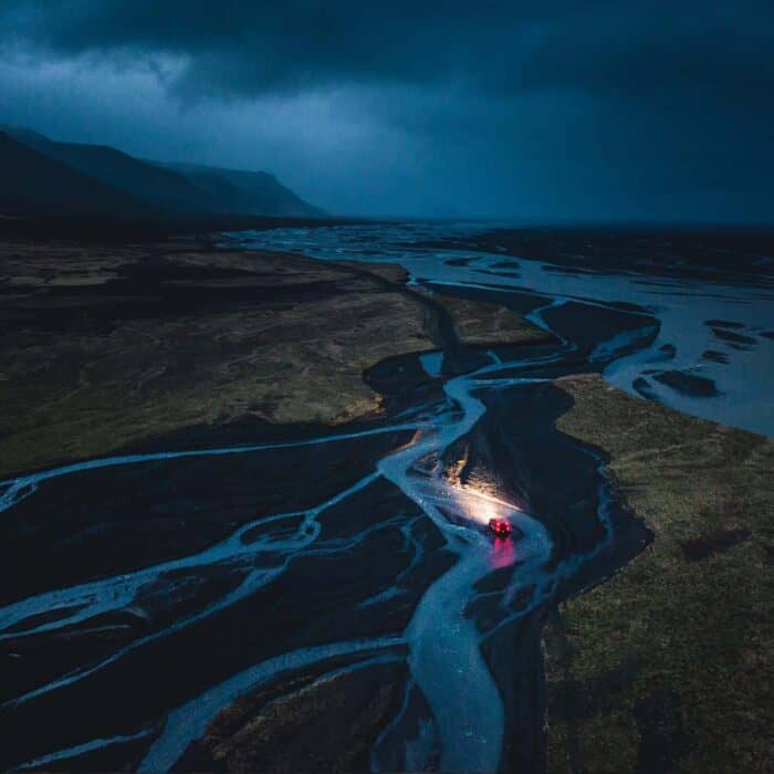 A super jeep crossing a river in the Icelandic highlands.