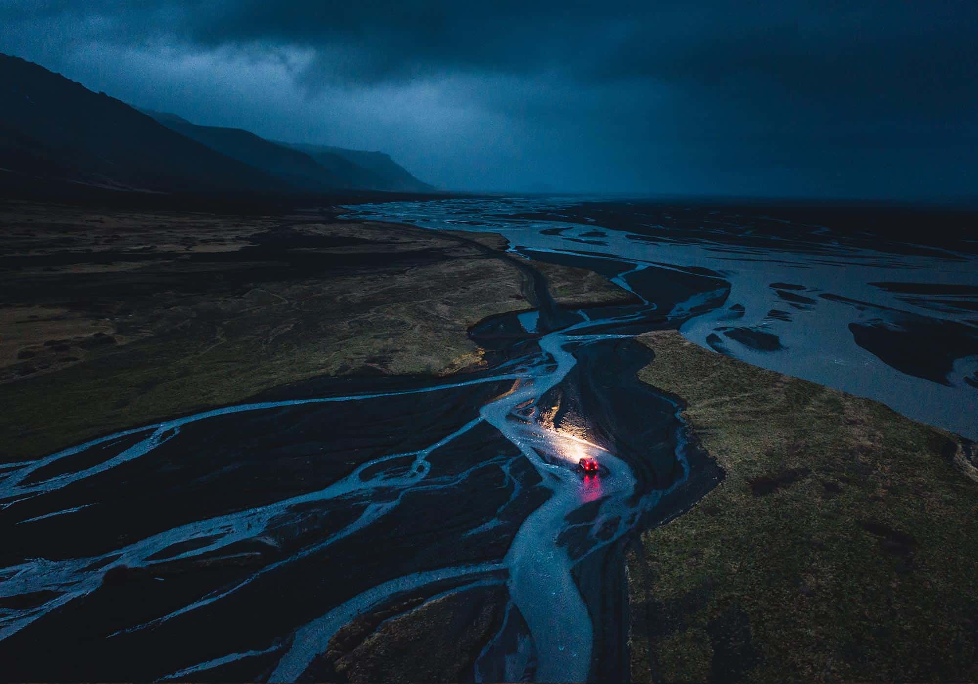 A super jeep crossing a river in the Icelandic highlands.