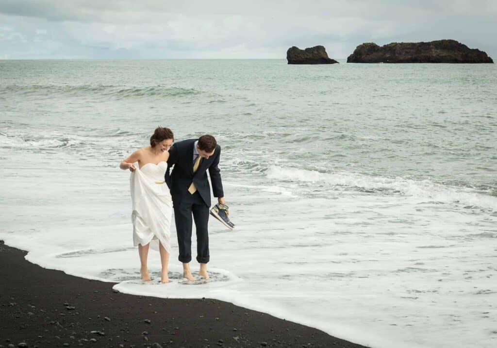 Wedding couple at a black sand beach in Iceland