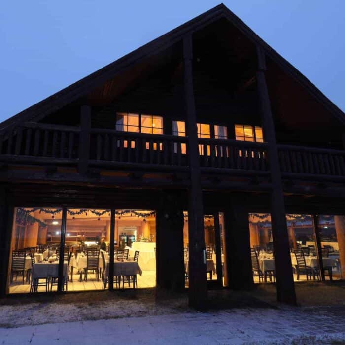 Exterior of Hotel Rangá on a snowy afternoon.