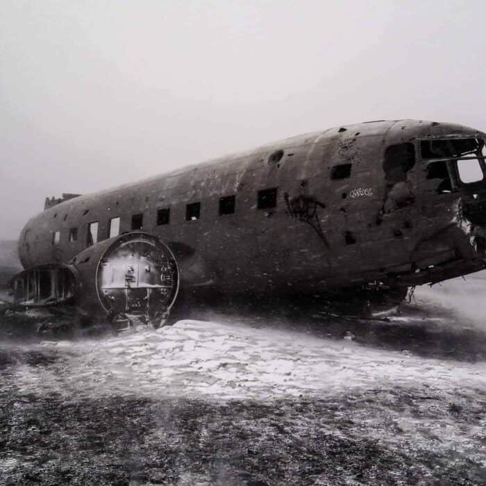 DC3 crushed metal plane wreck on a cloudy day in south Iceland.