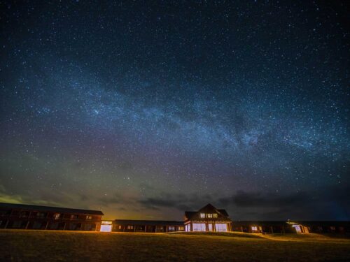 Hotel Rangá luxury resort underneath a starry night sky.