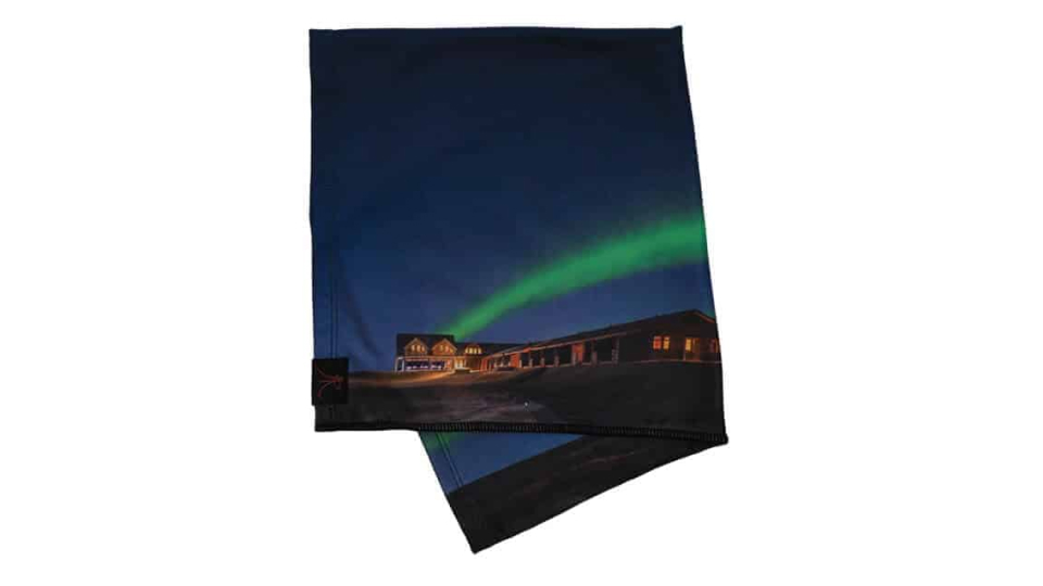 A buff design featuring a photo of Hotel Rangá and the northern lights.