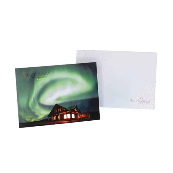 Hotel Rangá postcard featuring photo of green northern lights above Hotel Rangá in south Iceland.