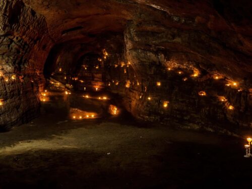 Lit candles set up for a wedding inside the Ægissíða cave in south Iceland.