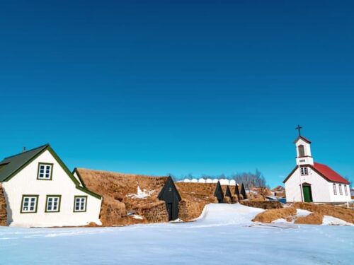 Turf houses and a church at Keldur in south Iceland.