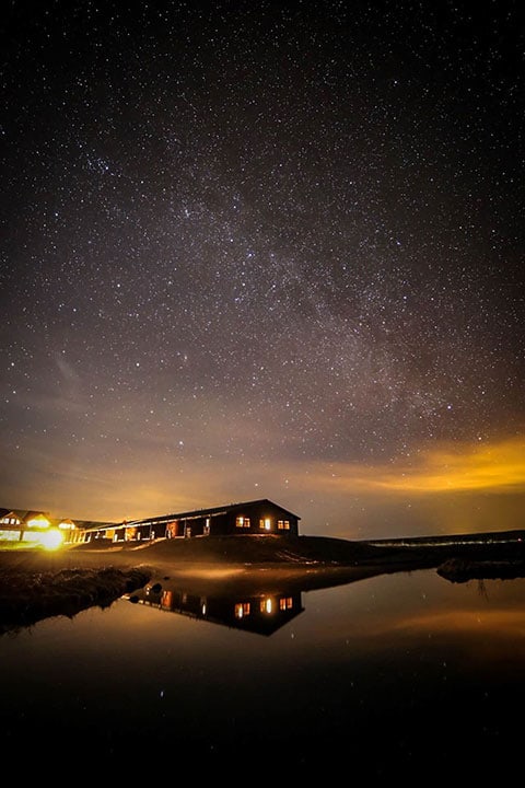 A sky full of stars above Hotel Rangá luxury hotel in south Iceland.