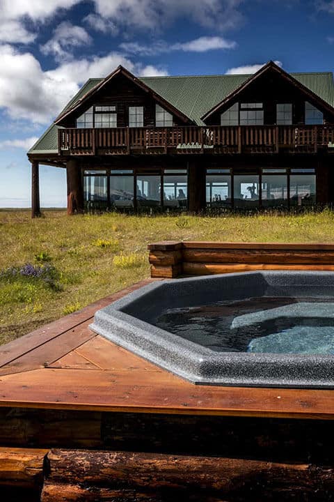 Geothermal hot tub beside Hotel Rangá luxury hotel in south Iceland.