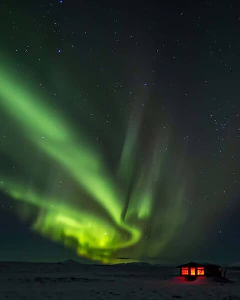 Green northern lights above the Rangá Observatory in south Iceland.