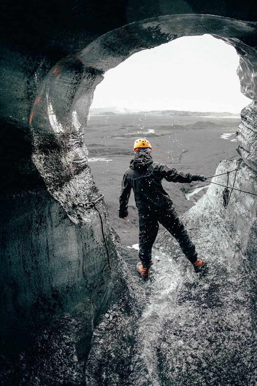 Man emerges from an ice cave near the Katla volcano in south Iceland.