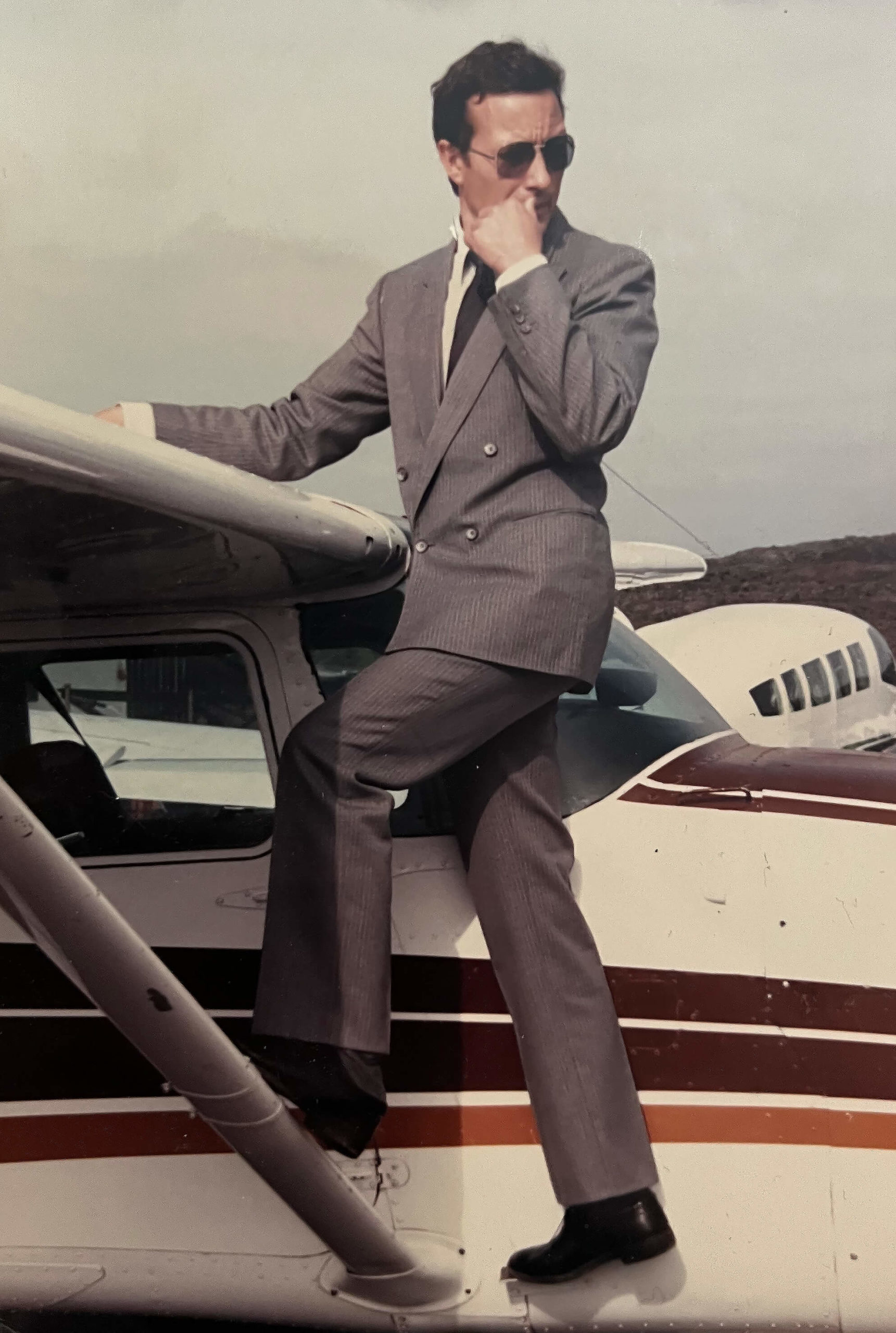 Friðrik Pálsson stands on an airplane