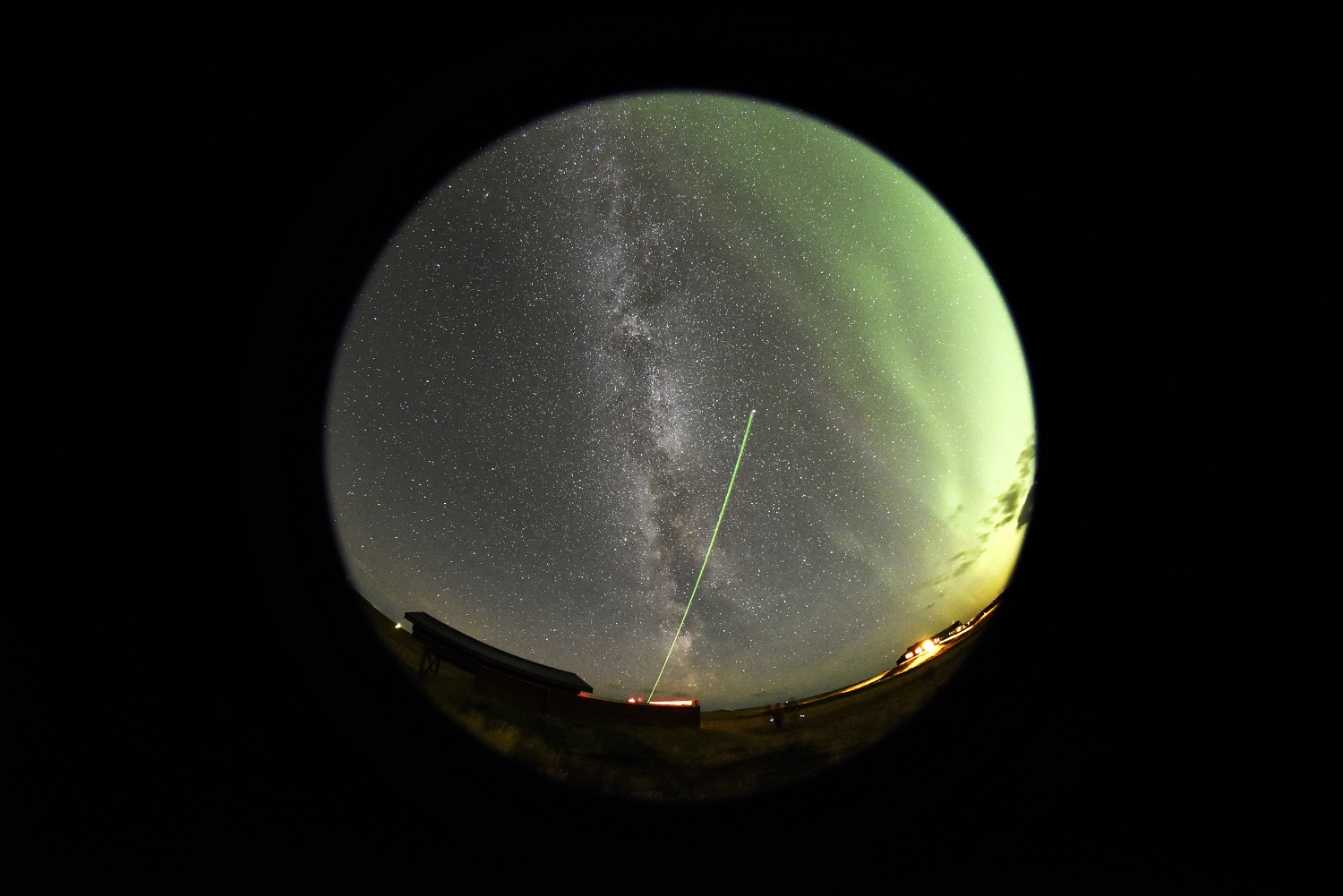 Stars and northern lights shot through a fisheye camera in the Hotel Rangá Observatory.