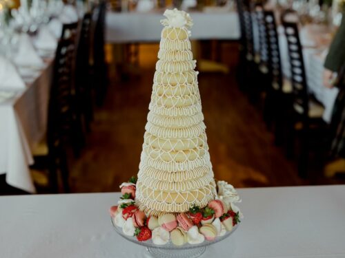 Traditional Icelandic wedding cake known as a kransakaka covered in delicate white icing at Hotel Rangá luxury hotel.