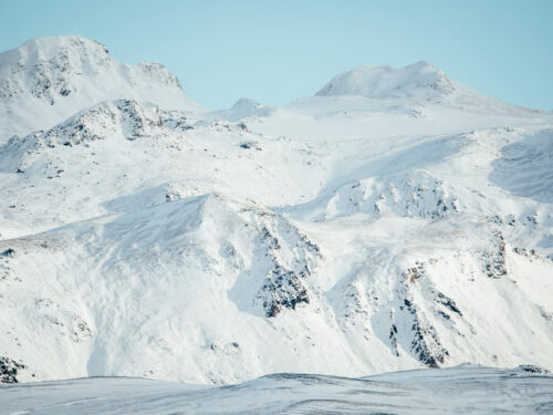 Snowy mountains on the way to Landmannalaugar in the Icelandic highlands.