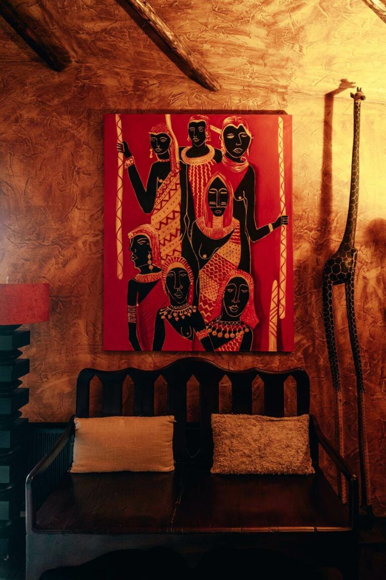 A painting of Africans in traditional dress that hangs in Hotel Rangá's Africa Suite.