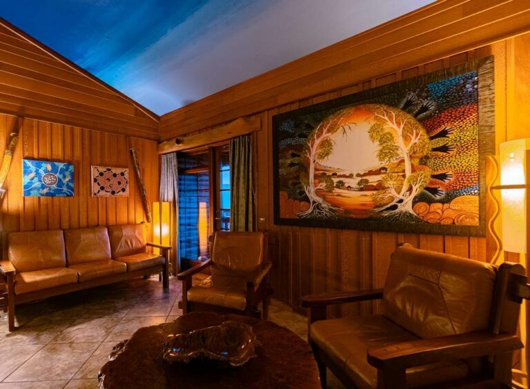 View of leather and wood couches in Hotel Rangá's Australia Suite.