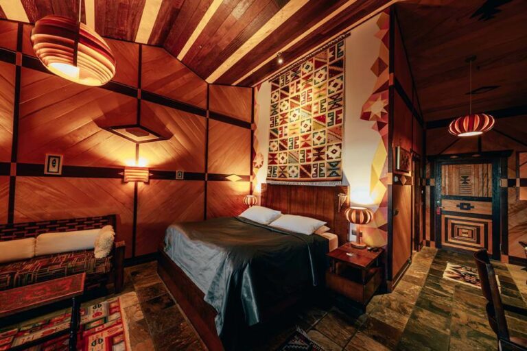 Hotel Rangá's South America suite decorated with authentic decor and artwork.